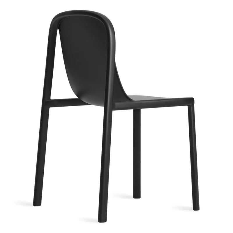 The Decade Chair from Blu Dot in black from the back at an angle.