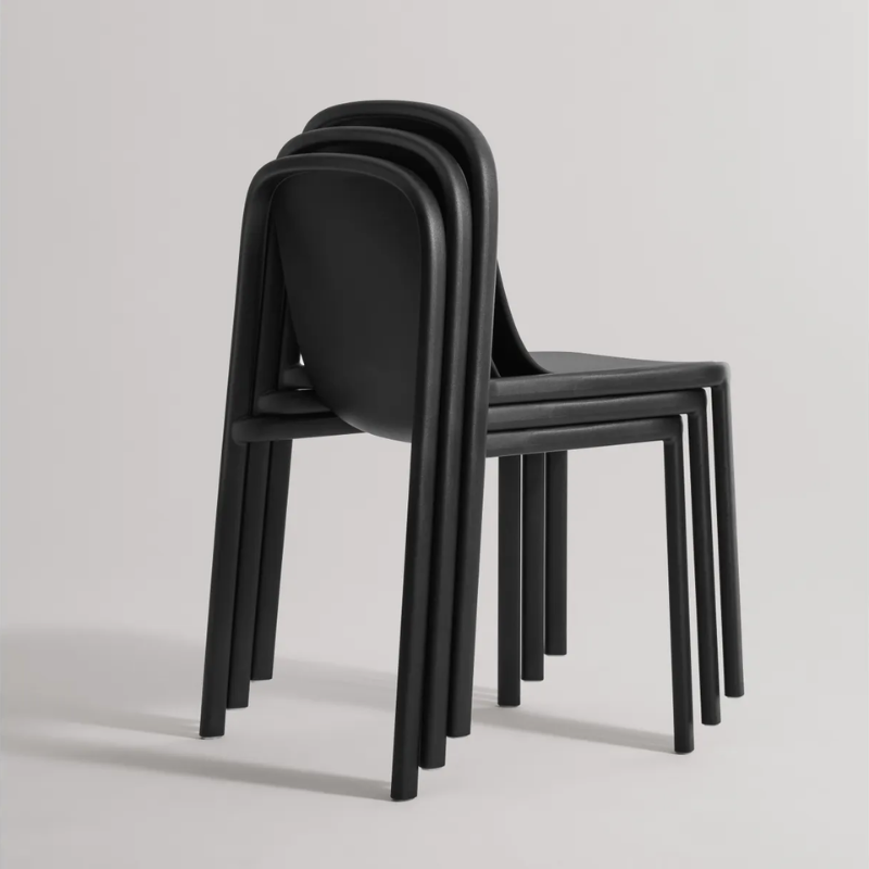 The Decade Chair from Blu Dot in a stack of three.