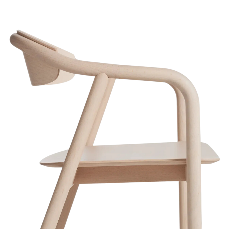 The Dibs Chair from Blu Dot in day from the side in detail.