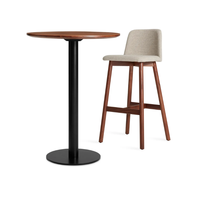 The 30 inch round bar height Easy Dining Table from Blu Dot in a lifestyle.