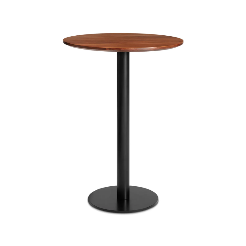 The 30 inch round bar height Easy Dining Table from Blu Dot with a walnut top and black base from an angle.