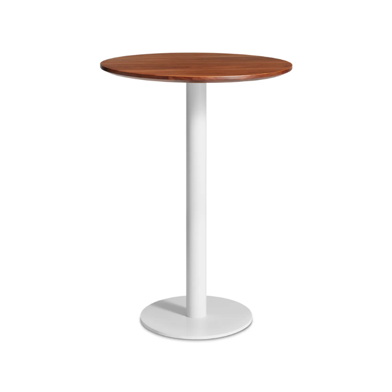 The 30 inch round bar height Easy Dining Table from Blu Dot with a walnut top and white base from an angle.