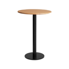 The 30 inch round bar height Easy Dining Table from Blu Dot with a white oak top and black base from an angle.