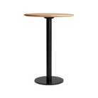 The 30 inch round bar height Easy Dining Table from Blu Dot with a white oak top and black base.