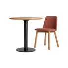 The 30 inch round Easy Dining Table from Blu Dot in a lifestyle.