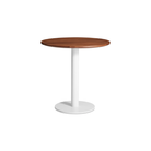 The 30 inch round Easy Dining Table from Blu Dot with a walnut top and white base from an angle.