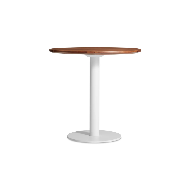 The 30 inch round Easy Dining Table from Blu Dot with a walnut top and white base.