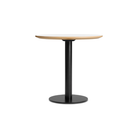 The 30 inch round Easy Dining Table from Blu Dot with a white laminate top and black base.