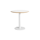 The 30 inch round Easy Dining Table from Blu Dot with a white laminate top and white base from an angle.