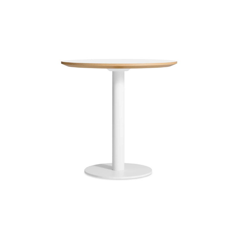 The 30 inch round Easy Dining Table from Blu Dot with a white laminate top and white base.