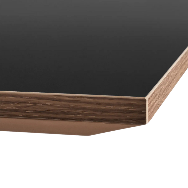 The 32 inch rectangular Easy Dining Table from Blu Dot with a black laminate table top.