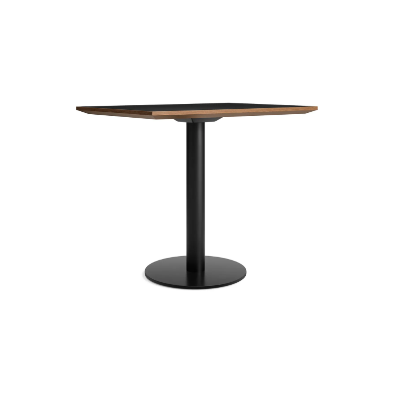 The 32 inch rectangular Easy Dining Table from Blu Dot with a black laminate top and black base from an angle.