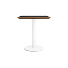 The 32 inch rectangular Easy Dining Table from Blu Dot with a black laminate top and white base from the side.