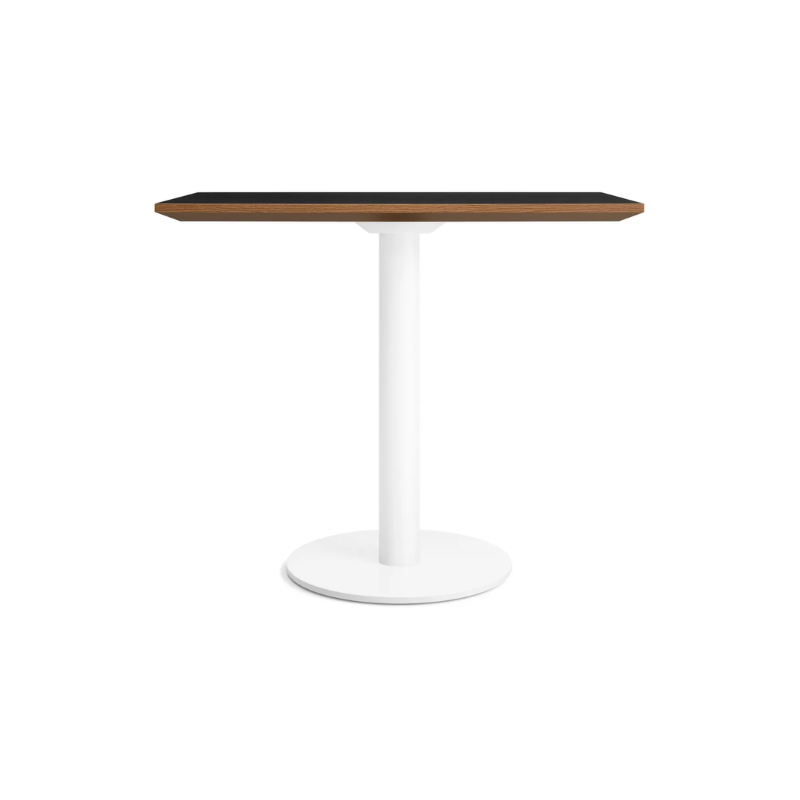 The 32 inch rectangular Easy Dining Table from Blu Dot with a black laminate top and white base.