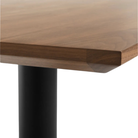 The 32 inch rectangular Easy Dining Table from Blu Dot with a walnut table top.