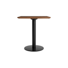 The 32 inch rectangular Easy Dining Table from Blu Dot with a walnut top and black base from the side.