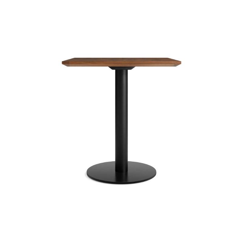 The 32 inch rectangular Easy Dining Table from Blu Dot with a walnut top and black base from the side.