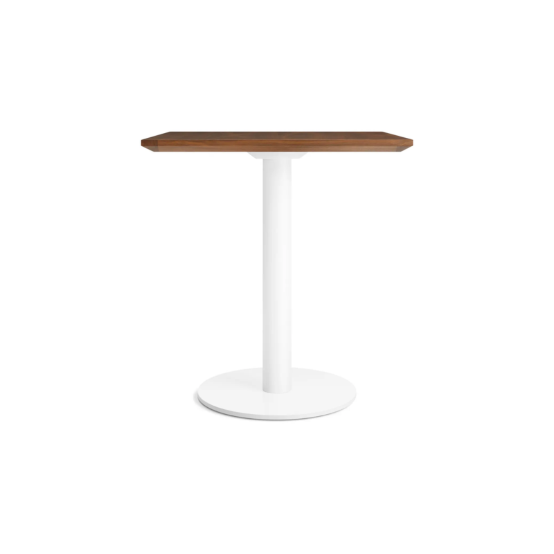 The 32 inch rectangular Easy Dining Table from Blu Dot with a walnut top and white base from the side.