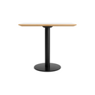 The 32 inch rectangular Easy Dining Table from Blu Dot with a white laminate top and black base.