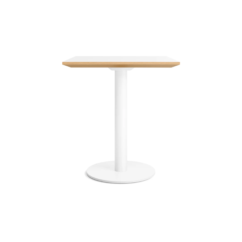 The 32 inch rectangular Easy Dining Table from Blu Dot with a white laminate top and white base from the side.