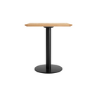 The 32 inch rectangular Easy Dining Table from Blu Dot with a white oak top and black base from the side.