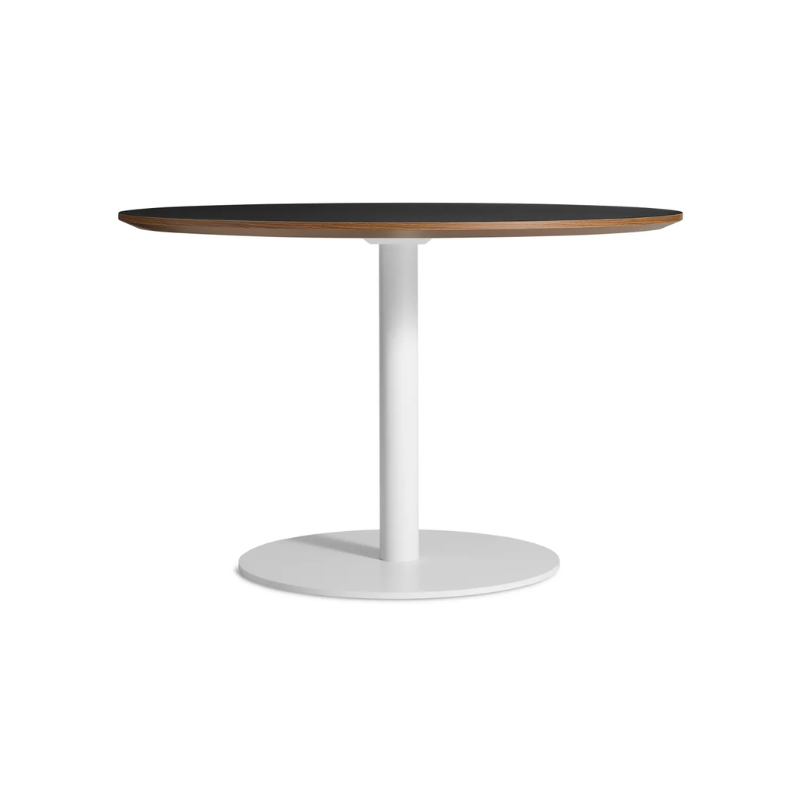 The 48 inch round Easy Dining Table from Blu Dot with a black laminate top and white base.