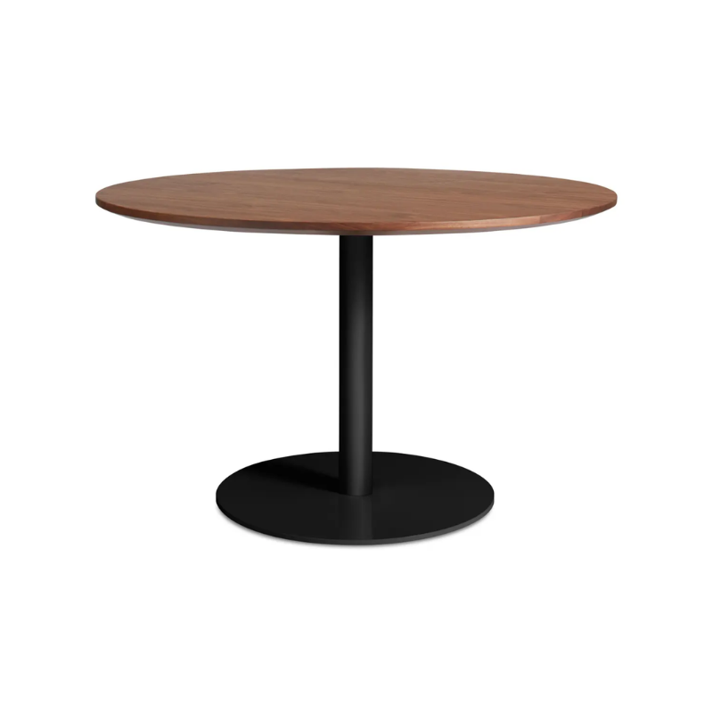 The 48 inch round Easy Dining Table from Blu Dot with a walnut top and black base from an angle.