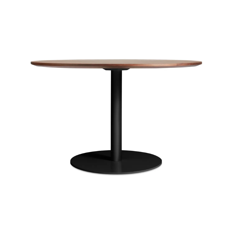 The 48 inch round Easy Dining Table from Blu Dot with a walnut top and black base.