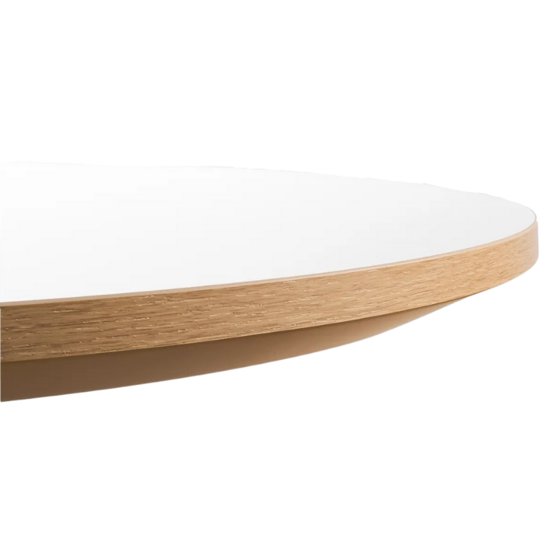 The round Easy Dining Table from Blu Dot with a white laminate table top.