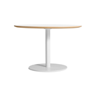 The 48 inch round Easy Dining Table from Blu Dot with a white laminate top and white base.