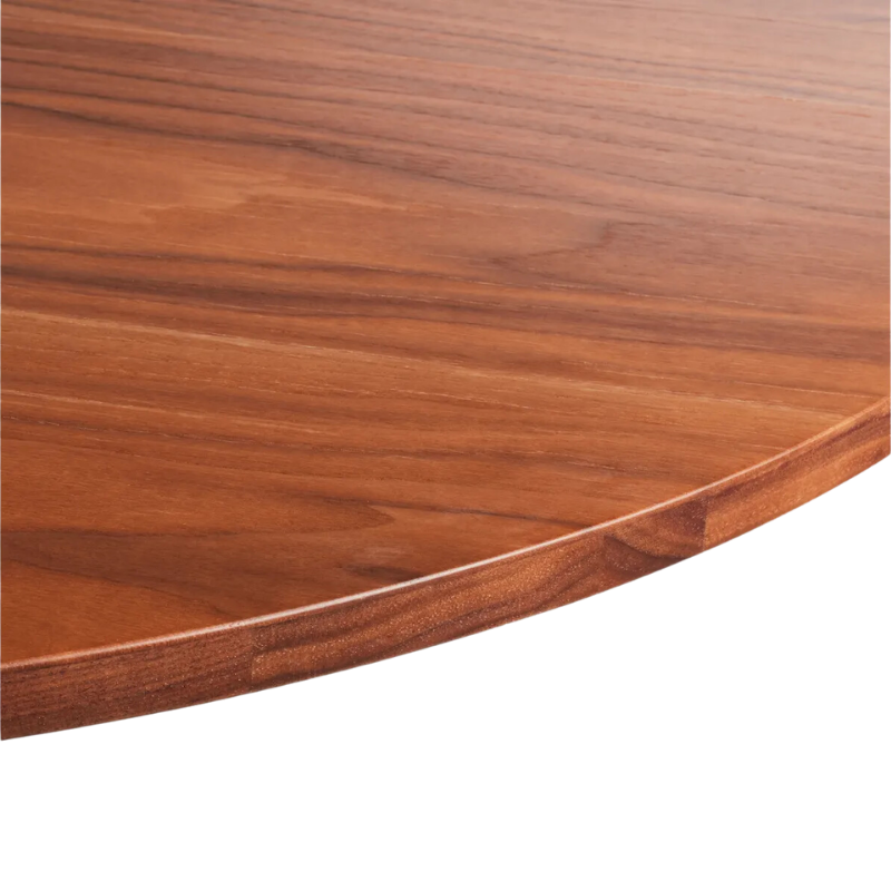 The round Easy Dining Table from Blu Dot with a walnut table top.