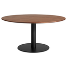 The 60 inch round Easy Dining Table from Blu Dot with a walnut top and black base from an angle.