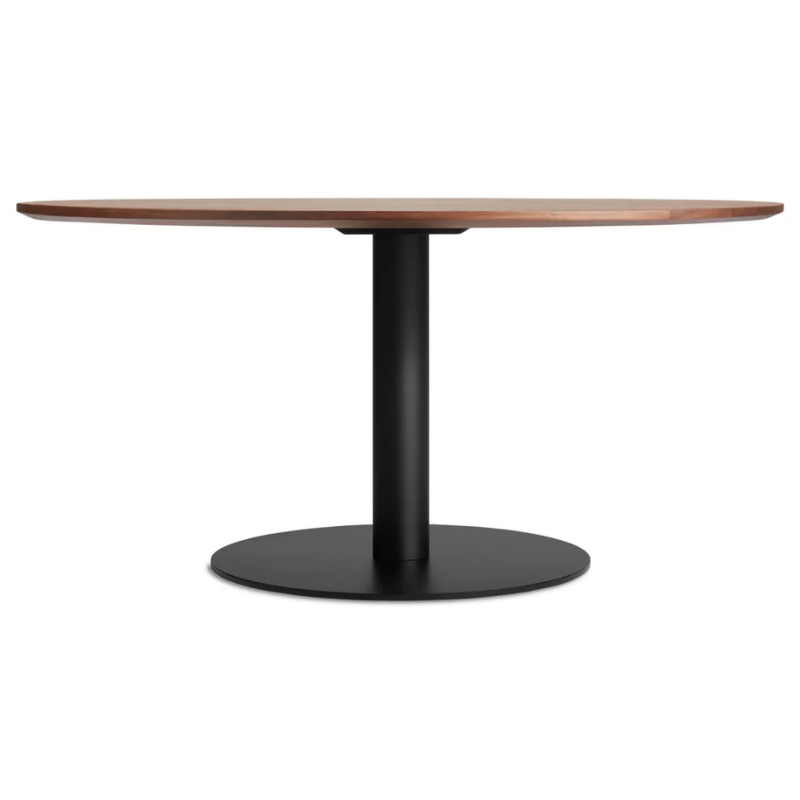 The 60 inch round Easy Dining Table from Blu Dot with a walnut top and black base.