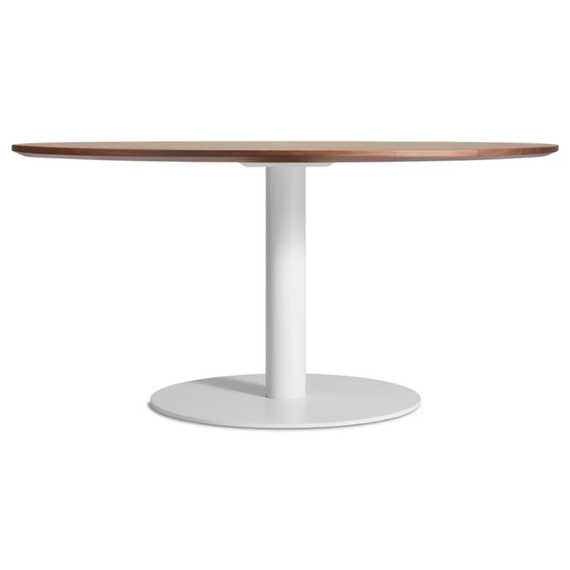 The 60 inch round Easy Dining Table from Blu Dot with a walnut top and white base.