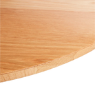 The round Easy Dining Table from Blu Dot with a white oak table top.