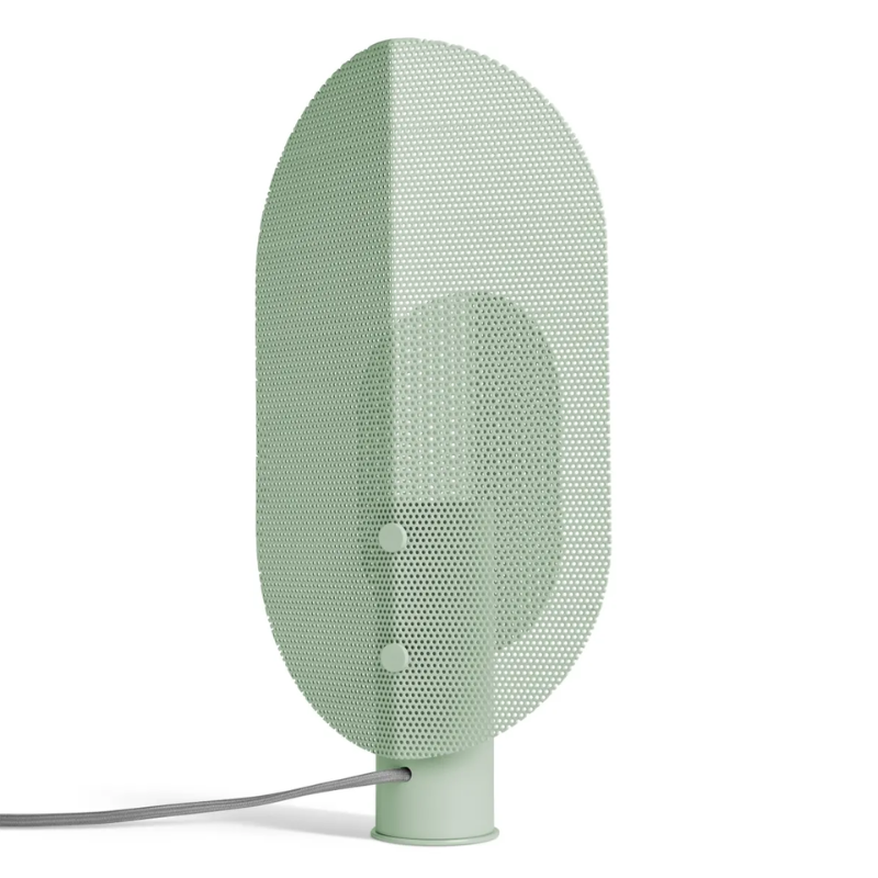 The Filter Table Lamp from Blu Dot in mint from the back at an angle.