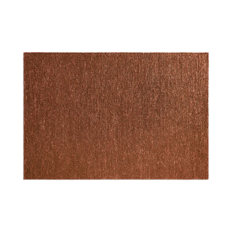 The 6 by 9 foot High Tide Rug from Blu Dot in terracotta.