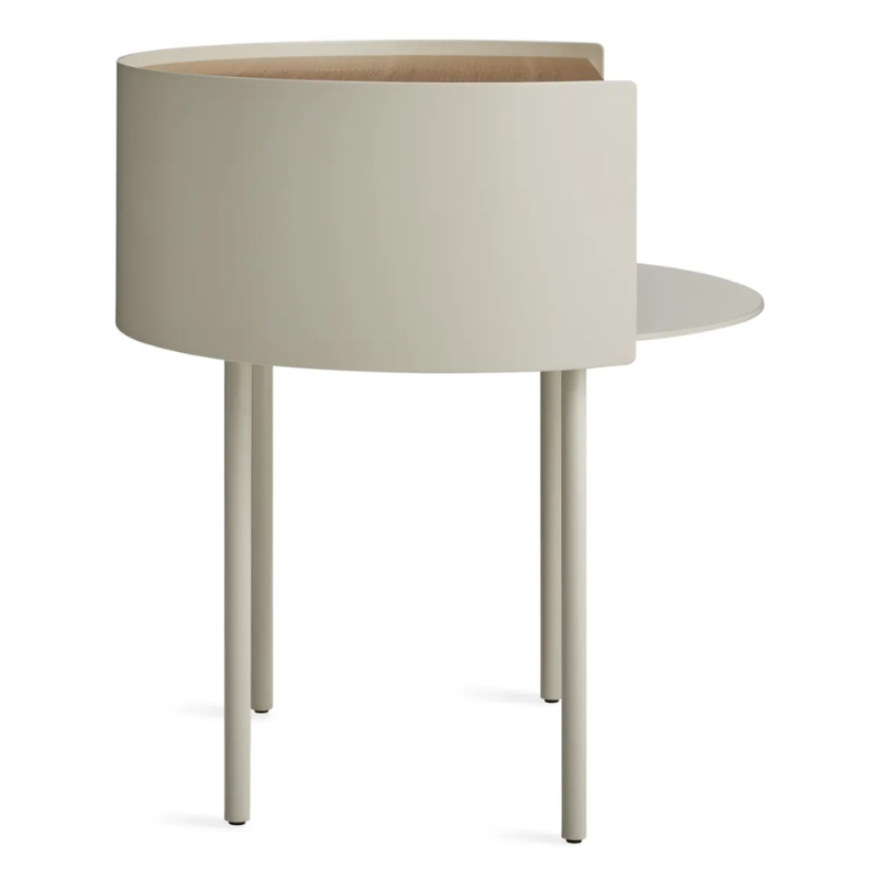 The Li'l Something Side Table from Blu Dot in putty from the side.