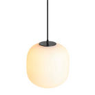 The large Midwinter Pendant Light from Blu Dot turned on from a high angle.