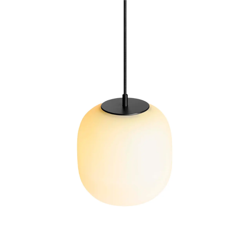 The small Midwinter Pendant Light from Blu Dot turned on from a high angle.