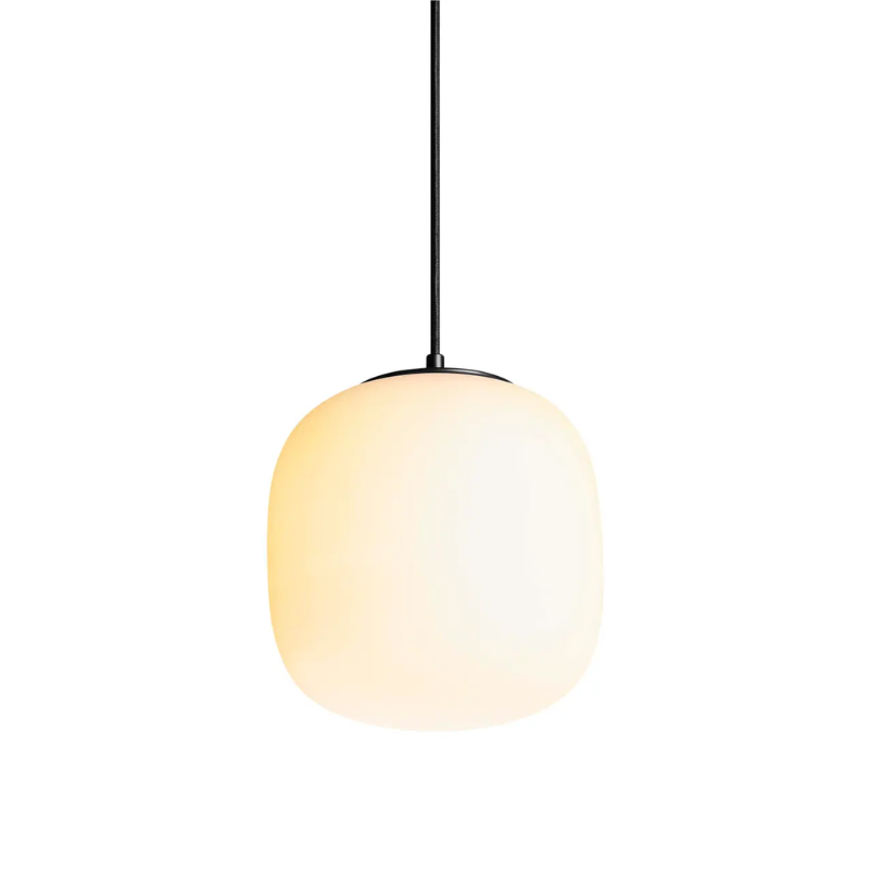 The small Midwinter Pendant Light from Blu Dot turned on from a low angle.