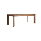 The 60 to 84 inch Moreover Extension Dining Table from Blu Dot in walnut extended from an angle.