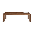 The 80 to 104 inch Moreover Extension Dining Table from Blu Dot in walnut collapsing.