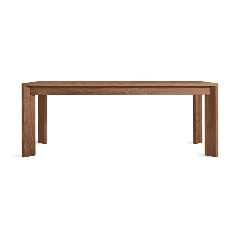 The 80 to 104 inch Moreover Extension Dining Table from Blu Dot in walnut.