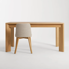 The 60 to 84 inch Moreover Extension Dining Table from Blu Dot in white oak in a lifestyle.