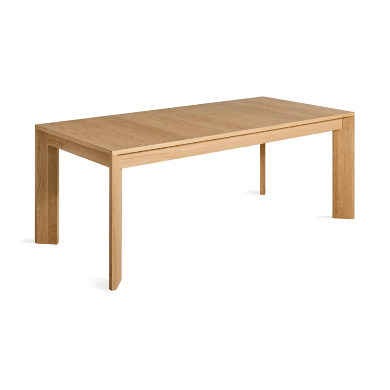 The 80 to 104 inch Moreover Extension Dining Table from Blu Dot in white oak from a top angle.