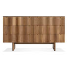 The Murmur 6 Drawer Dresser from Blu Dot in walnut.