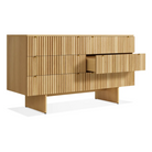 The Murmur 6 Drawer Dresser from Blu Dot in white oak with an open drawer.