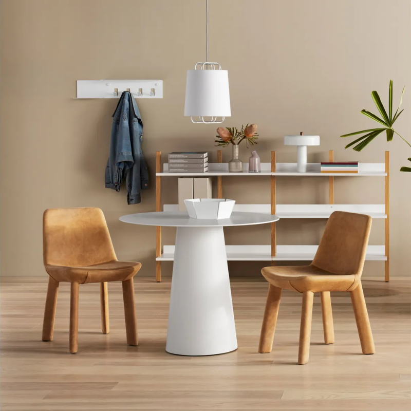 The Neat Chair from Blu Dot in a dining room.