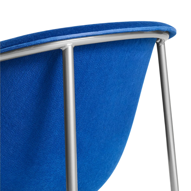 The Past Life Chair from Blu Dot with cobalt seat and silver base in a close up.